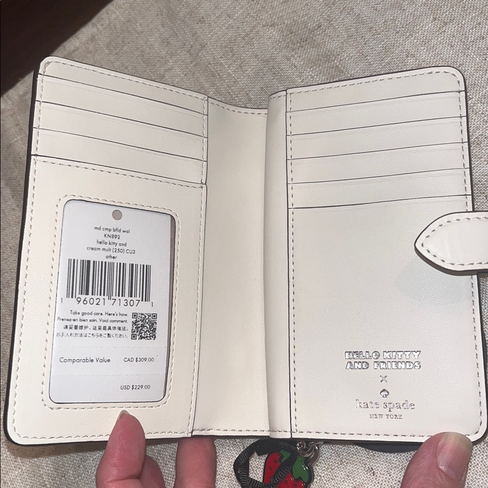 kate spade NWT! x Hello Kitty & Friends Medium Bifold Wallet - Picture 6 of 9